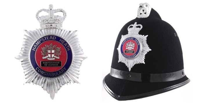 Traditional British Helmet Of Metropolitan Police And Other Hats